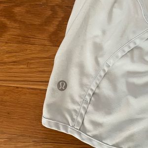 icing colored lululemon size four speed ups. $35